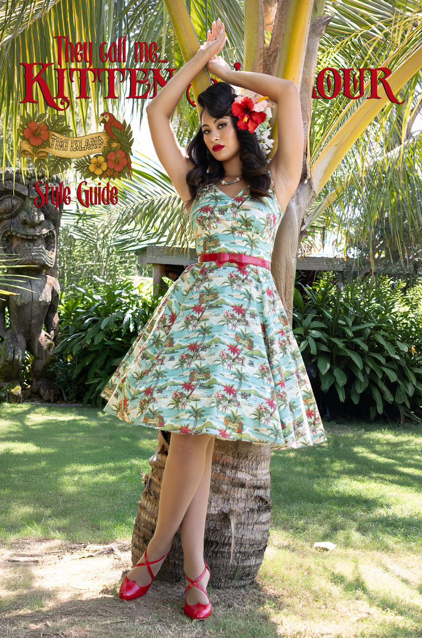 A woman wears the Tiki Dress